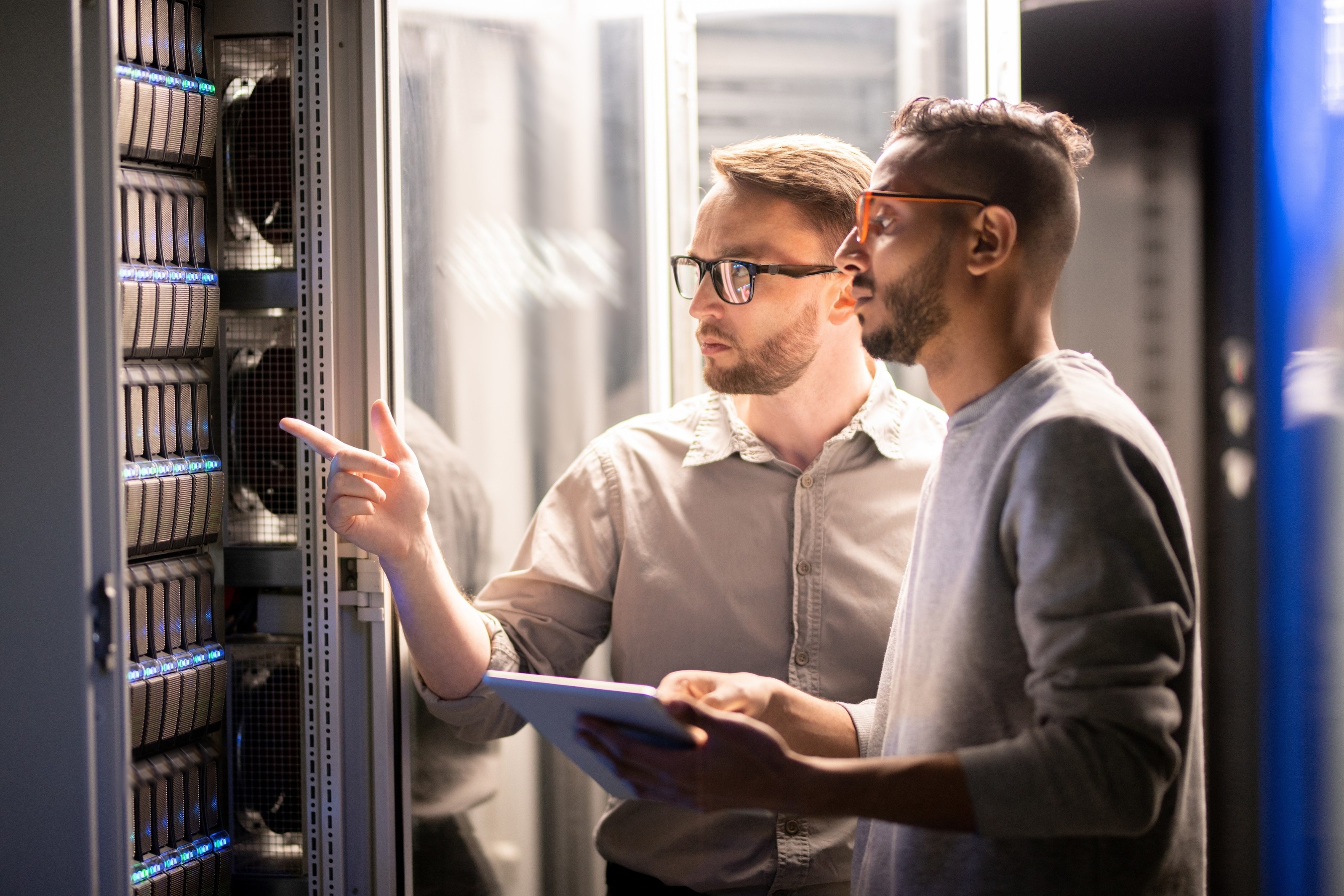 colleagues collaborating in data center